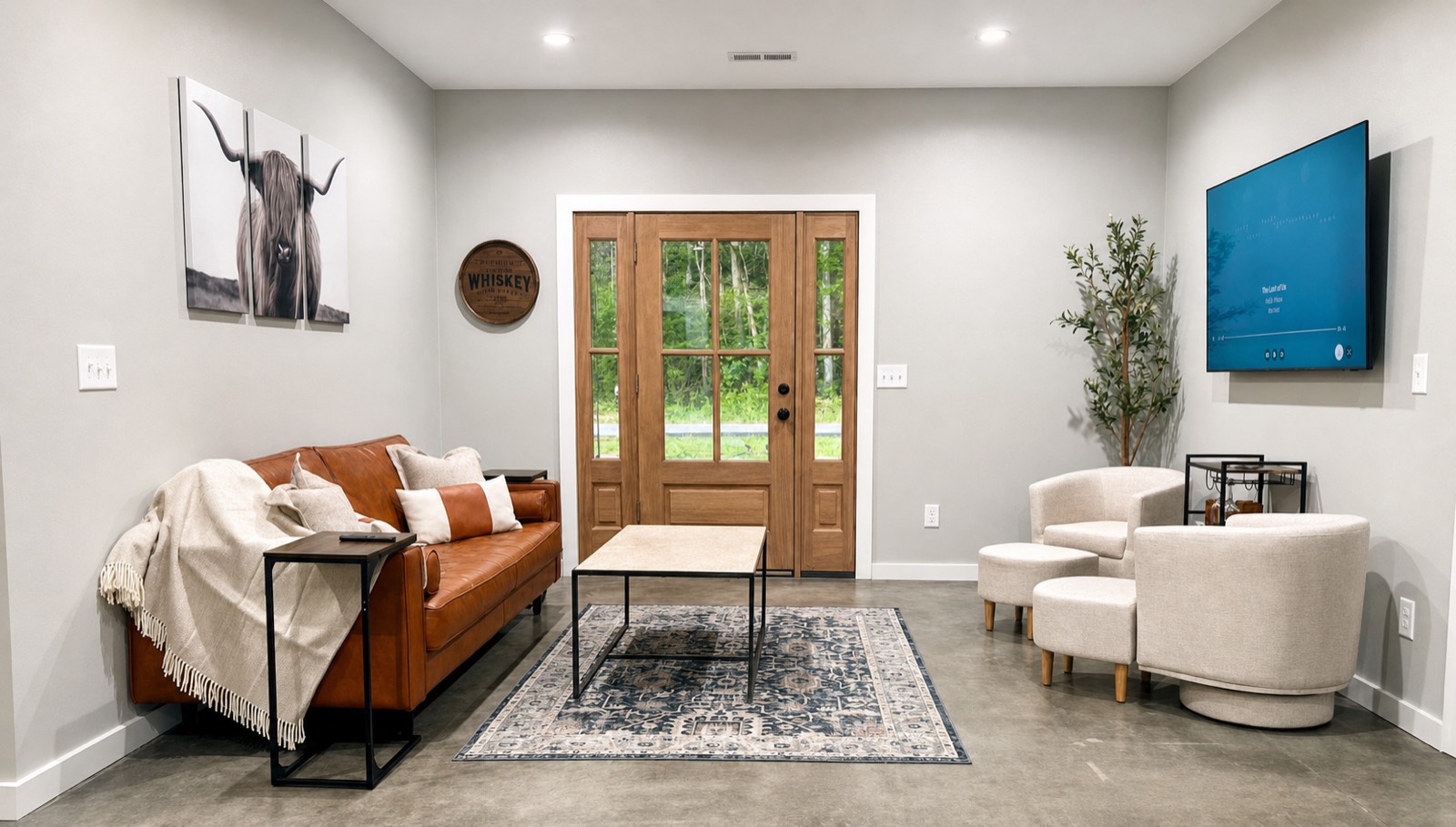 Open living room with leather sofa