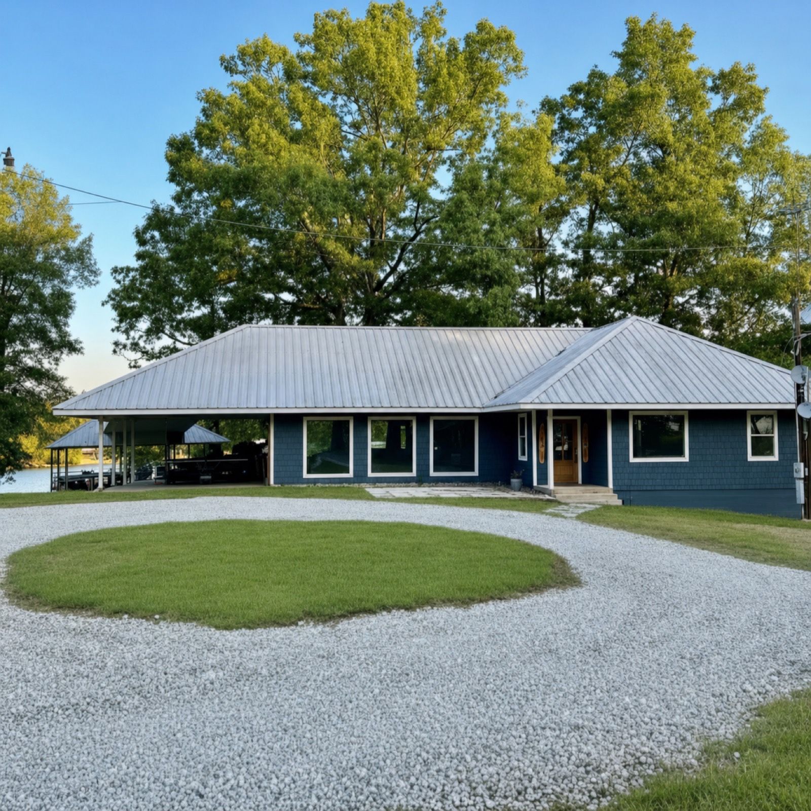 Front of the home with roundabout driveway